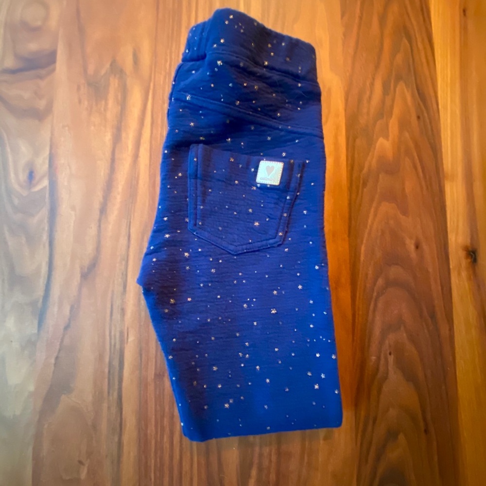 Star printed leggings (sweater sold separately).